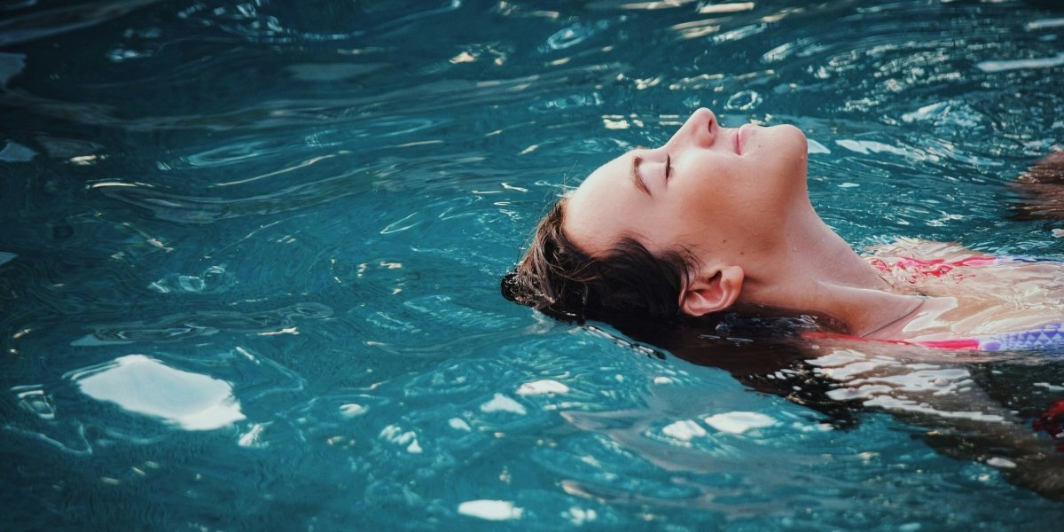 What Pool Season Does to Color-Treated Hair and How the Right Color-Safe Shampoo Counters It